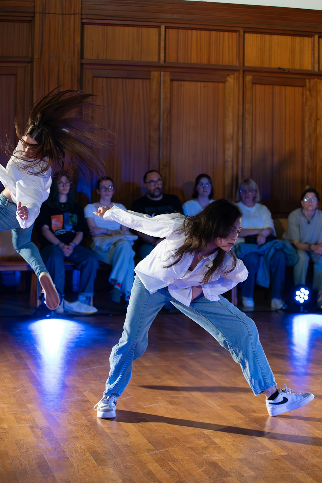 a-couple-of-people-that-are-on-a-dance-floor-3wduefs8tw8