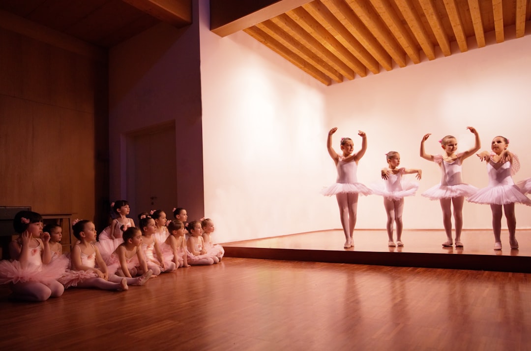 group-of-people-dancing-on-brown-wooden-floor-jt6oqamqx2o